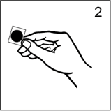 A hand holding a small black circle

Description automatically generated